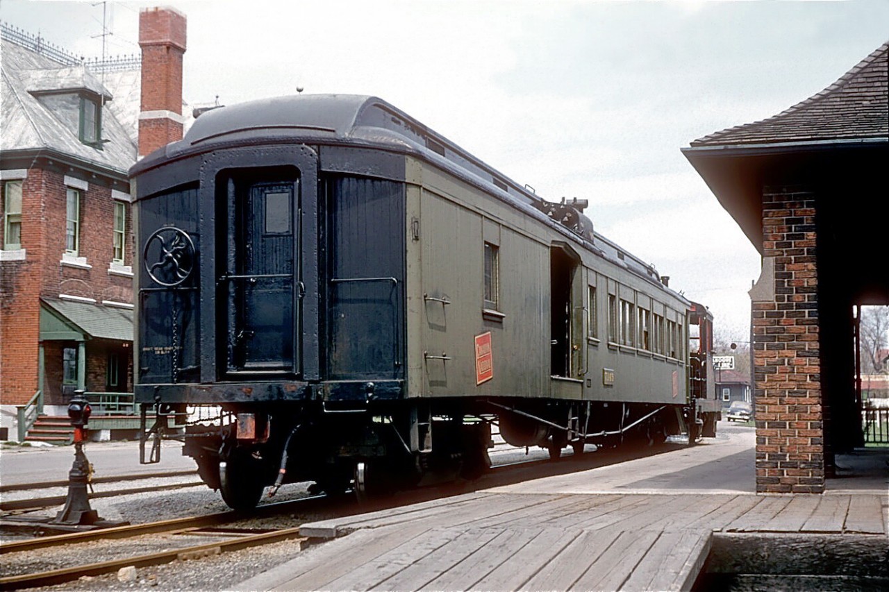 A succession of elderly pieces of passenger rolling stock were utilized by the Thousand Islands Railway over the years.  Canadian National combination car 7145 served from 1952 to 1959 when it was retired.  It had been built in 1911 by the Preston Car & Coach Company for the Canadian Northern Quebec Railway. It's seen here after arriving at Gananoque station with diesel-electric 500, after making the 4.5 mile trip from Gananoque Junction (another view of the train in front of the station from a different angle: http://www.railpictures.ca/?attachment_id=24039).