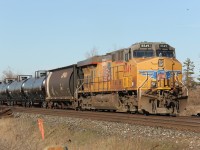 UP 5549 brings up the rear of CP 650 at about 18:00 on April 14, 2016. Leader was CP 8809. The shot was taken just west of Trafalgar Road, at Sixth Line.