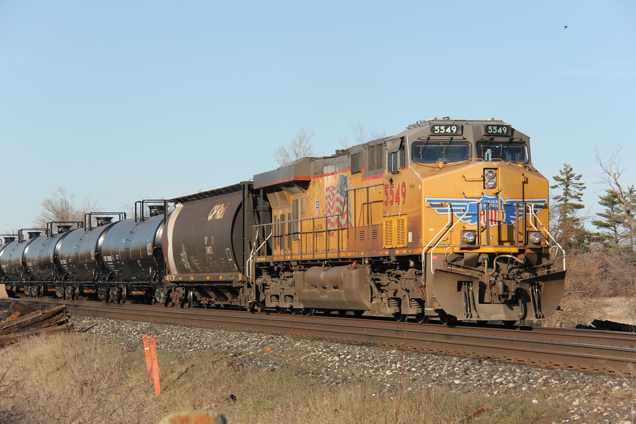 UP 5549 brings up the rear of CP 650 at about 18:00 on April 14, 2016. Leader was CP 8809. The shot was taken just west of Trafalgar Road, at Sixth Line.
