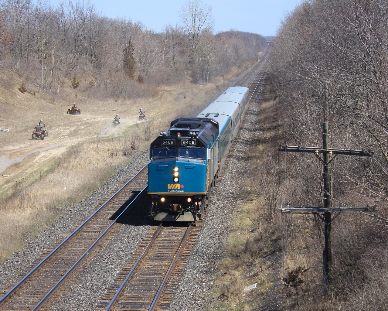 VIA 6408 met some atv riders while flying along the dundas sub.