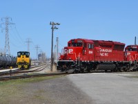 CP 5024 shoves back into the Yard, and it shows ETR 107 sitting on the interchange yard, after being brought back to Canada, after being sent to Michigan for some major mechanical repairs.