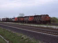 Not the best weather or scenery but how could you pass this up CN WB 9501 9513 B&LE 843 and a CN 9106 with the cab windows blanked out . Only by chance while walking around the new GO sub that this came about for a photo. 