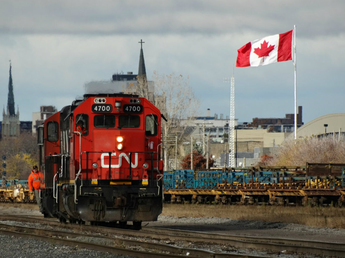 The morning CN yard crew has just pushed a cut of cars west to Egerton street in London for the next Windsor train to lift. The yard power 4700 4131 is now headed west toward Highbury Ave where it will go west around the back yard lead and tie up   on the west side of Egerton street. A strong wind out of the north made for a bitterly cold fall day.