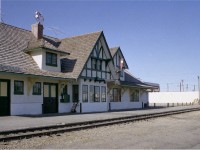 This heritage CN station was built in 1930, replacing a smaller structure. It was a beauty for its' time; had ticket and express offices, separate washrooms, separate waiting rooms, inc one for ladies and one for smokers. CN got rather ambitious with this building on account CP was running a branchline into town and CN wanted to remain competitive. How different from today!!  The Budd car, #6104, I believe at that time ran from Vegreville to N. Edmonton daily. It was cancelled once VIA took over operations by 1978. The golden era of rail travel is over, but at least the station was preserved.