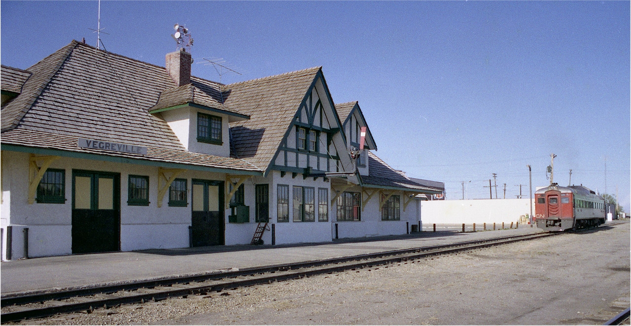 This heritage CN station was built in 1930, replacing a smaller structure. It was a beauty for its' time; had ticket and express offices, separate washrooms, separate waiting rooms, inc one for ladies and one for smokers. CN got rather ambitious with this building on account CP was running a branchline into town and CN wanted to remain competitive. How different from today!!  The Budd car, #6104, I believe at that time ran from Vegreville to N. Edmonton daily. It was cancelled once VIA took over operations by 1978. The golden era of rail travel is over, but at least the station was preserved.