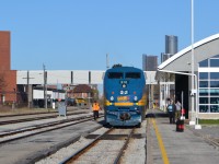 VIA 910 gets situated for it's trip East on VIA #72, and ETR 108 switches Hiram Walkers in the background.