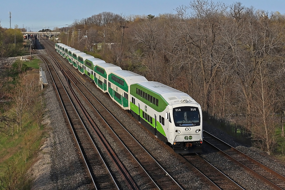 A new-style cab car heads up this westbound commuter hauler that's just left Aldershot Station heading for Hamilton.