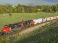 517 from Belleville rarely runs, but when it does, it usually has some interesting power. Today seems to be the case as a lengthy 517 crawls up the hill at Beare with a clean SD60 leading the way. CN 5476 & CN 2157