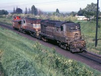 The westbound Cobourg turn at Bowmanville this May 28, 1972 is well supplied with dirt and short on revenue cars. The Cobourg turn still runs, sometimes to Trenton, but not every day.