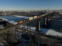 Brand new ET44AC #3023 pulls Q119 across the North Saskatchewan River