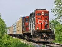 580 headed out to service Rembos lumber in Cainsville, ON with CN 4131 and 7 cars