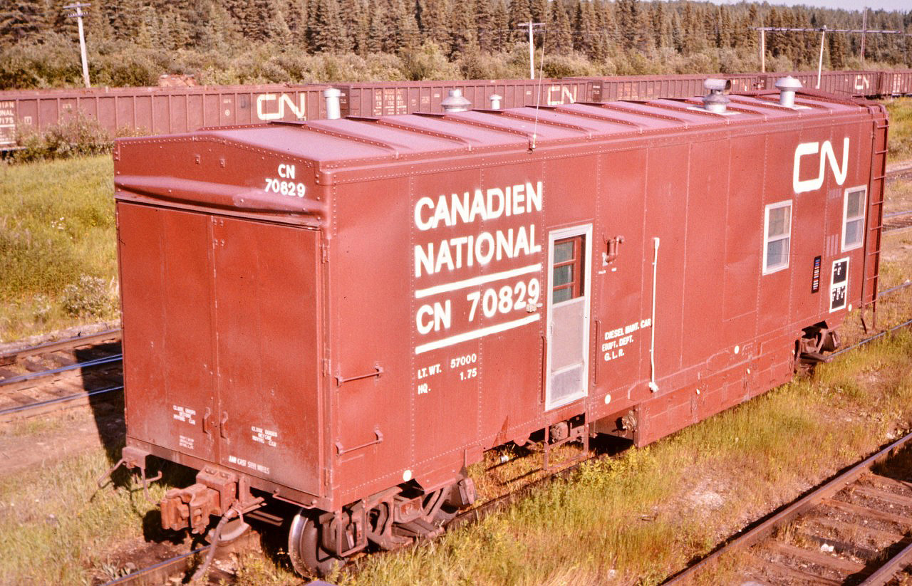 Oba, ON was a busy place at CN in mid-summer 1976.  A Regional tie renewal gang was working west on the Ruel Sub, a Car Department road repair car was in town for a wheelset changeout on a work equipment flat car, and  CN 70829 Diesel Maintainers Car was also there for a little work on the wayside power plants. This self-contained shop on wheels had a fully equipped work area in one end, and bunk, kitchen & dining facilities (BK&D) in the other. It's about a year and a half since this car was released from CN's Pointe St. Charles shops (HQ 1-75).