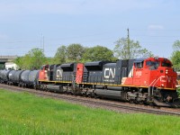 394 rolling east through Garden ave with CN 8102 - CN 8101 and 176 cars