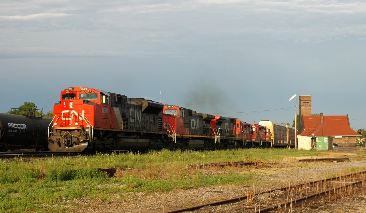 CN 8904, CN 2638, CN 2031, CP 8201, and CP 8223 lead 399 through Brantford with 158 cars