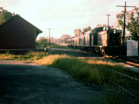 CN 1321 is crossing the CP diamond at Inglewood in this July 1960 photo. I'm guessing this is Barrie to Hamilton train 662 which was due at Inglewood about 6 pm.