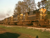 This CN westbound freight is at Bowmanville on a May 1966 evening. One difference between CP and CN in these days was CP's habit of under powering freights with one or two units, while on CN one was more likely to see sets of 3 or 4 GP-9s or in this case RS-18s with an RS-3. CN freights were usually cruising along at track speed and CP would be grinding it out at 30-40 mph. Perhaps the fact that CN had almost twice as many diesel units as CP had something to do with this.