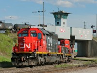 SD40's at the hump ? You bet ! A triple set consisting of a pair of SD40-3's sandwiching a YBU-4 pull CN 305's train out of receiving yard. The YBU-4 is just dead weight and used for additional braking power. 