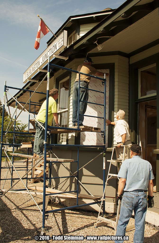 This is something you will never ever see anywhere else.  On this very hot and humid spring day, I went and got my first shots of the ex-CN Burlington West (also known as Freeman) Station. These were my first shots of it since 2005, just after it was moved to the fire station property on Fairview Street. As many of us know this was due to the expansion of GO train service in the Golden Horseshoe, which required a third track. 

In it's 'new' location a very dedicated group of workers are measuring up the window. But it's just not any group of workers, they're all volunteers and members of the Friends of Freeman Station Society. I met one of the volunteers who oversaw all the projects...and he gave me the royal tour. He was so good he even talked me into becoming a member!