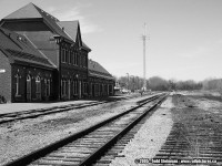 From Daniel Odette's recent post of his photo of the Stanley Street crossing, he had mentioned how much has changed on the rail scene in Niagara Falls. 
<br>
My first trip to the station was a few years before this photo was taken. The massive rail yard (in front of the station) was long gone along with all other structures related to the steam and early diesel era. However, there were still 4 tracks intact.
<br>
Here, in 2005 - I came to the station on my second trip and found two sidings were gone. Little did I know too that the Victoria Street yard had also vanished. The area is a sad place to visit...almost forgotten...and even sadder upon my last trip to the grounds in 2009. Weeds have overtaken most of the area, although, somewhat good news is the fact that GO is now operating seasonally.
