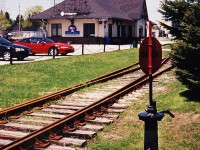 <b> HAPPY VICTORIA DAY! </b> ...well, for 2003 anyways. The CN station in it's after life as a Rail / Marine Museum. Some tracks and this switch are still in place, and an older van sits permanently at the north end of the station. Well worth the visit. 