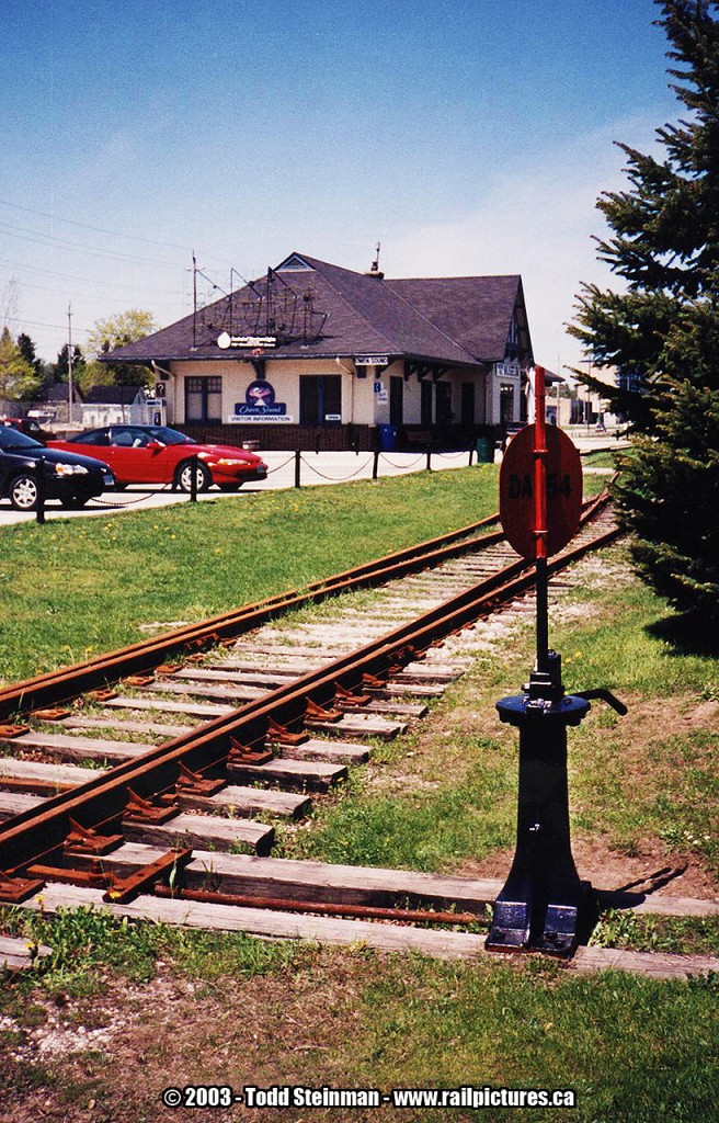 HAPPY VICTORIA DAY!  ...well, for 2003 anyways. The CN station in it's after life as a Rail / Marine Museum. Some tracks and this switch are still in place, and an older van sits permanently at the north end of the station. Well worth the visit.