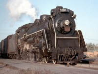 A late afternoon Canadian National commuter train from Toronto stops at Port Credit Station in 1957. Power today is CNR 5250, the first of the J-7-a class Pacifics built by MLW in 1918 (originally built as Canadian Governmental Railways 478). As dieselization progressed on Canadian railways in the mid-late 1950's, the remaining steam power was often found in or relegated to less glamourous duties, including commuter runs, freight service, local assignments, pusher/helper service (like <a href=http://www.railpictures.ca/?attachment_id=22158><b>CP 2839 *here*</b></a>) and extra/standby duties. 5250 was scrapped the next year in June 1958.
