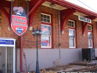 I remember a trip to Carleton Place in the late 80's / early 90's and I made my family stop at the Havelock station so I could use the washroom! I took a photo then...train included, and I remember it clearly - but unfortunately through the years I lost that photo. 
<br>
Once a major divisional point on the CPR, the Havelock station has seen many changes over the years, including at one point abandonment. However, it survived, and now houses the Station Restaurant, as well as a Mr. Sub franchise upon my last drive by in 2010. I love this picture, because not only does it show the traditional name board that was hand painted, but a retro looking CPR themed sign for the Station Restaurant. But besides the signage, there is the architecture.
<br>
Beautifully restored. 
<br>
And the divisional point? Well, the yards are fairly intact, although sometimes not as full as it once was. But the Kawartha Lakes Rwy. still calls in town.
