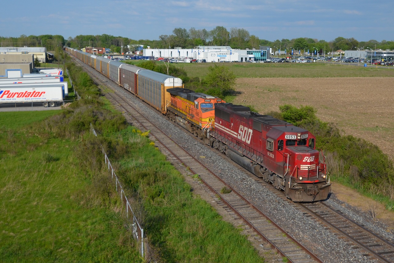For the second time this week, CP 147 is led by SOO 6053. Here they are passing under Veterans Memorial Parkway