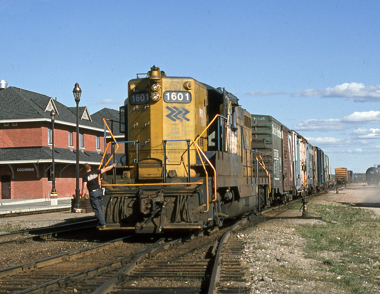Yard engine 1601 works the west end of the yard at Cochrane. Modernized station serves the "Polar Bear Express" to Moosonee