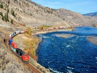 CN 8883 leads a westbound Intermodal alongside the Thompson River near Martel.