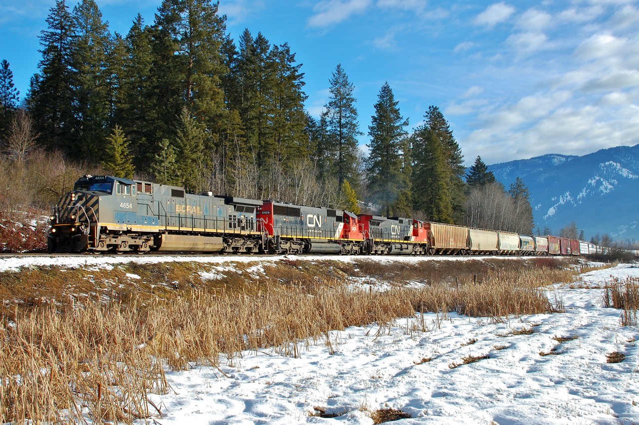 It's a nice January day in Armstrong as 3 units haul the local freight out of town towards Kamloops.