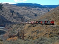 CN nos.8941,2717 & 8944 bring an eastbound load of empties around the curve towards Savona.