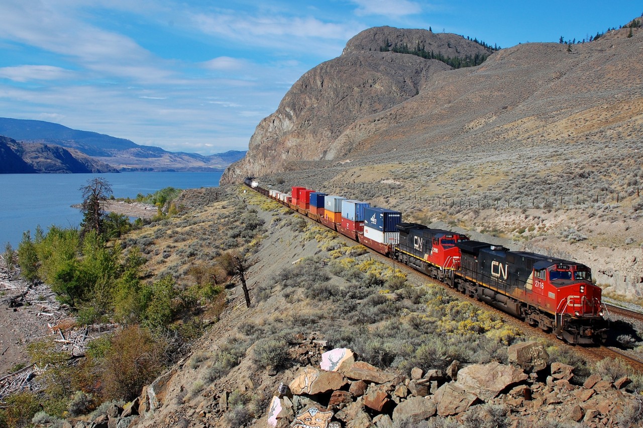 A mixed freight is eastbound at Kissick behind CN nos.2716 & 2195.