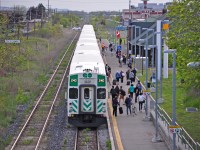 The first GO Train of 2015 arrives in St Catharines. Though I normally don't find interest in shooting the GO, shooting the first one of the year is always fun, and it adds it helps makes the Grimsby Sub a little more interesting. And before you ask, no I don't know the people waving to me :)