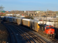 CN 309 is slowly departing Turcot West with a new crew. CN 2862 is leading with CN 2888 mid-train.