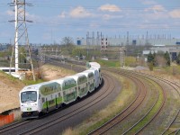 <b>A cab car that almost looks like a locomotive.</b> A fairly new cab car (GOT 304) leads a westbound GO Transit train through Whitby, with GOT 616 pushing. 