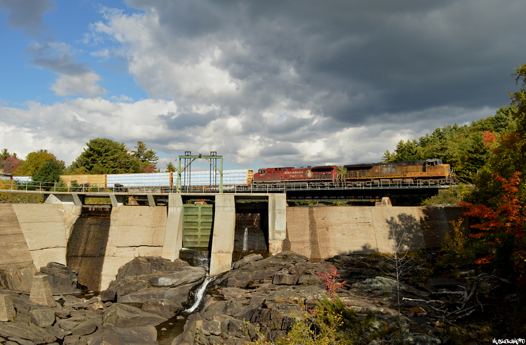 UP 5438 and CP 9617 hustle CP 420 across the Seguin river bridge under some dramatic lighting, with a clearance in hand they'll cross over to CP's Parry Sound sub shortly for the final 20 miles home.