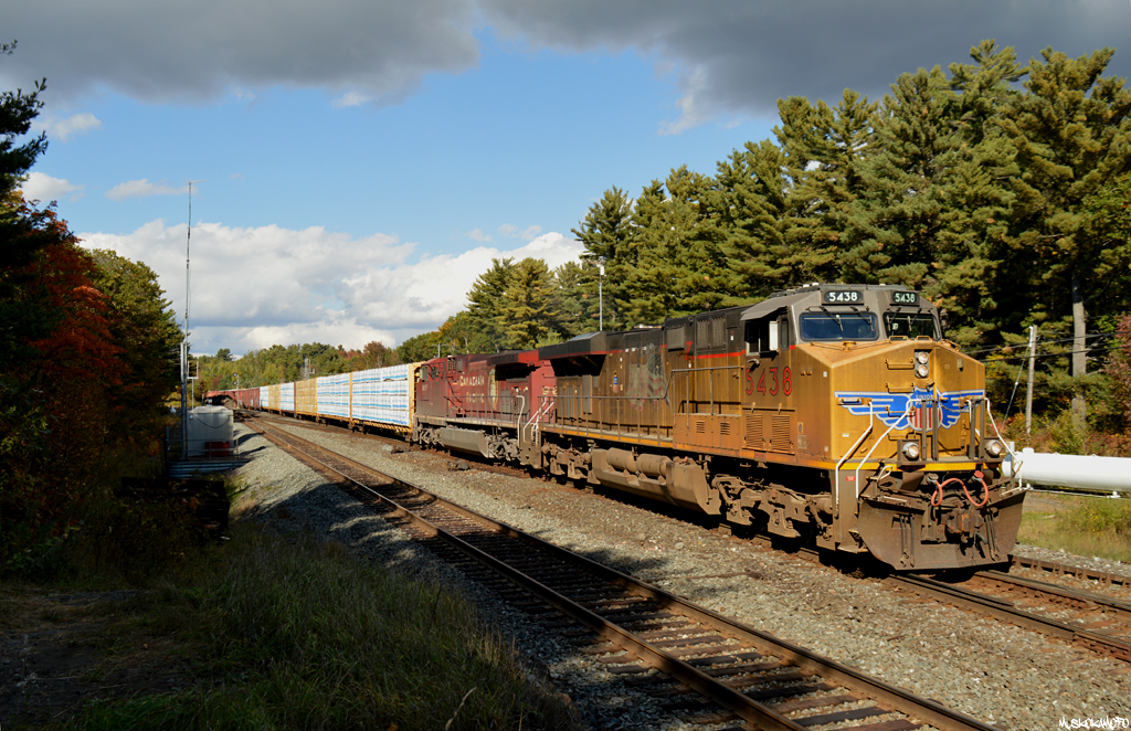 UP 5438 South diverging from CN's Bala sub back to CP's Parry Sound sub, authorized to Station Name Sign MacTier with train 420 from Thunder Bay. I wish the storm had been further to the North!