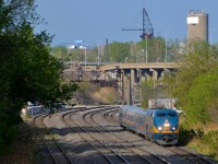 <b>No more tunnel behind the signal bridge.</b> VIA 639 for Ottawa has just passed the signal bridge which marked the western end of the short tunnel which was lifted off the tracks in pieces over a few weeks recently.