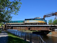 <b>Back to the maintenance centre.</b> VIA 6414 pushes the now empty VIA 30 back to VIA Rail's maintenance centre in Pointe St-Charles and over the Lachine canal.