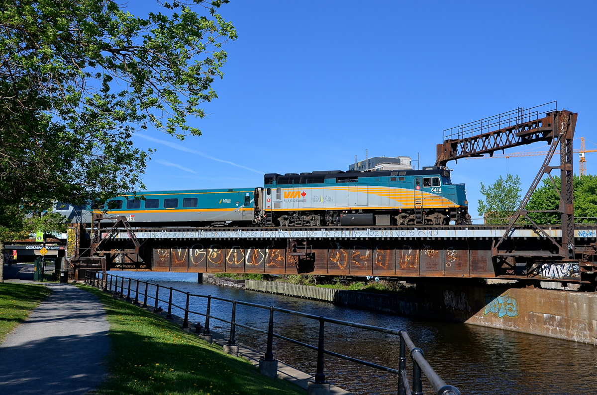 Back to the maintenance centre. VIA 6414 pushes the now empty VIA 30 back to VIA Rail's maintenance centre in Pointe St-Charles and over the Lachine canal.