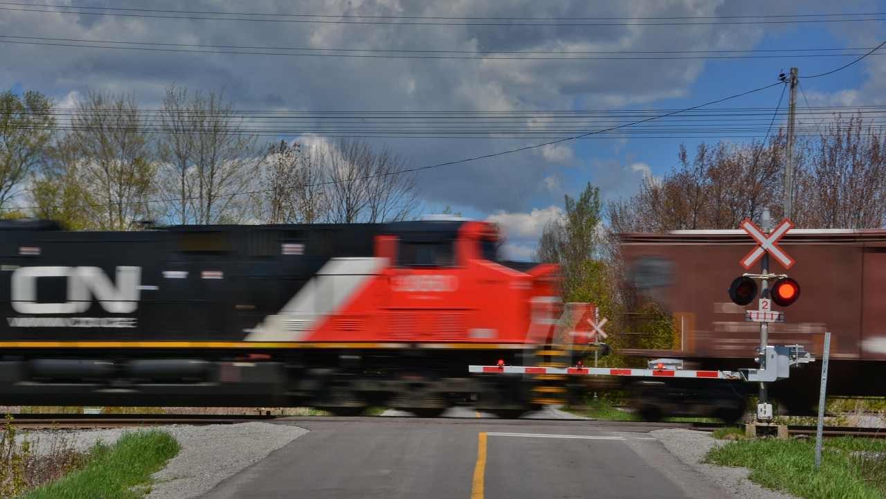DPU 3066 assists CN 305 ( CN 2843 west )  at Townline Road ( CN Newtonville crossover )