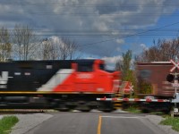 DPU 3066 assists CN 305 ( CN 2843 west )  at Townline Road ( CN Newtonville crossover )