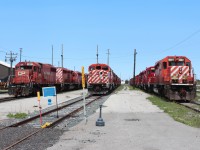 3 tracks of stored SD models at the east end of plant #2. From left on track 2 is former hump unit #6621 an ex-SOO SD40-2. Track 3 has one of two red barn SD40-2F that are left #9006.