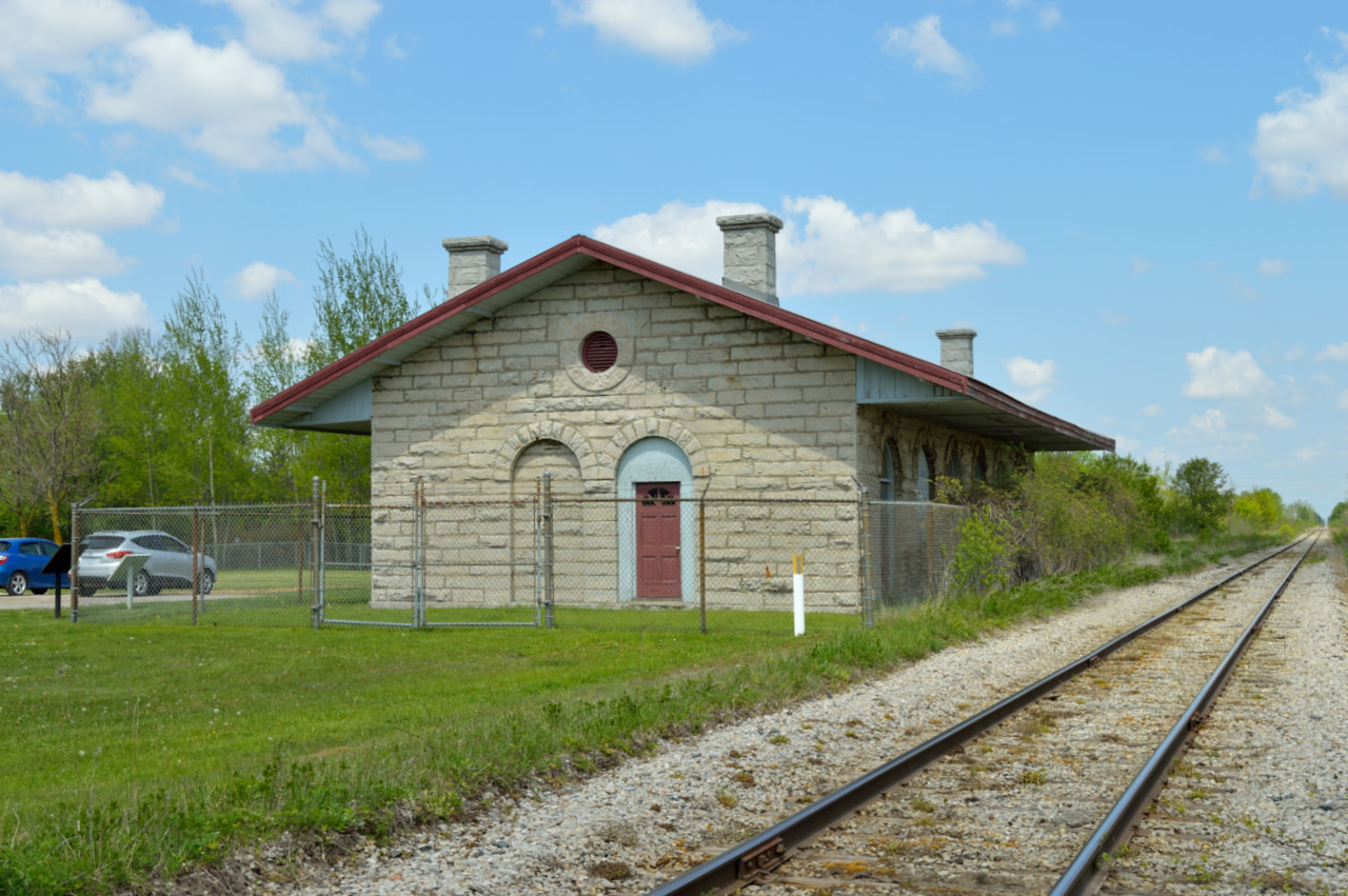 The 1858 limestone depot of the GTR still stands along the former Thorndale Sub at the location once known at St. Mary's Jct; where the Thorndale Sub continued southwest to London, and the Forest Sub began towards Sarnia.  Just out of frame at left is GTW caboose 79176, built in 1957.