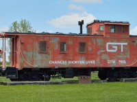 Former Grand Trunk Western caboose 79176 rests next to the former St. Mary's Junction station along the GEXR Guelph Sub.  The Guelph Sub, originally the Brampton Sub, ended at Stratford.  West of Stratford it was the Thorndale Sub which continued to London.  From St. Mary's Junction the Forest Sub ran west to Sarnia.  The 1858 limestone depot is just out of frame at right.