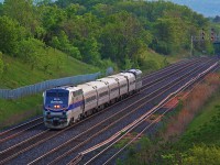 Host did end up getting the better tail shot of the Hickory Creek, so I didn't see a point bothering. In this case, I was also just lucky, and decided to wait out at Jordan to see if Via 98 would have Amtrak 184 again. Sure enough it did, but what was at the tail end warranted a frantic chase to Burlington, and opted for Lemonville Road. The bridge that is, not the hangout spot down below. Sure enough, I got there several minutes ahead of it. As seen, Amtrak 184 leads the regular five Amfleet coaches and the 20th Century Limited 'Hickory Creek' private car into Aldershot. As mentioned in Host's photo, it is returning stateside via the New York bound Maple Leaf on May 30th. The last time I saw private cars on the Leaf was five years ago, and there was three of them. Nonetheless, they are far more rare than your Amtrak heritage unit, as there's two or more a year, and usually come by several times before leaving the Albany division back to Chicago.
