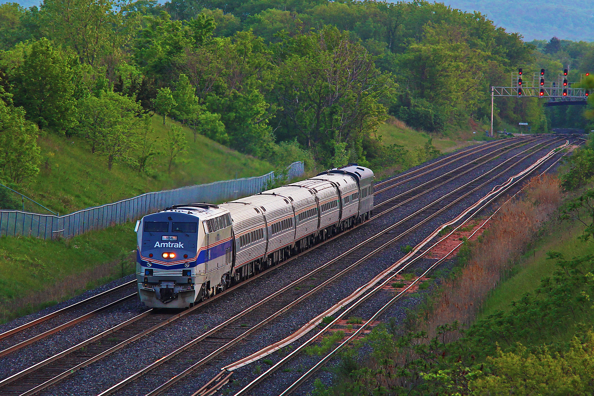 Host did end up getting the better tail shot of the Hickory Creek, so I didn't see a point bothering. In this case, I was also just lucky, and decided to wait out at Jordan to see if Via 98 would have Amtrak 184 again. Sure enough it did, but what was at the tail end warranted a frantic chase to Burlington, and opted for Lemonville Road. The bridge that is, not the hangout spot down below. Sure enough, I got there several minutes ahead of it. As seen, Amtrak 184 leads the regular five Amfleet coaches and the 20th Century Limited 'Hickory Creek' private car into Aldershot. As mentioned in Host's photo, it is returning stateside via the New York bound Maple Leaf on May 30th. The last time I saw private cars on the Leaf was five years ago, and there was three of them. Nonetheless, they are far more rare than your Amtrak heritage unit, as there's two or more a year, and usually come by several times before leaving the Albany division back to Chicago.