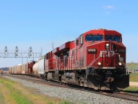 Having left the majority of the train on the yard CP 8785 and 8856 leave heading east with less than 20 cars.