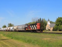 The "Princeton Flyer" returns from London and prepares to switch hoppers at Stubbes plant before continuing it's journey east.